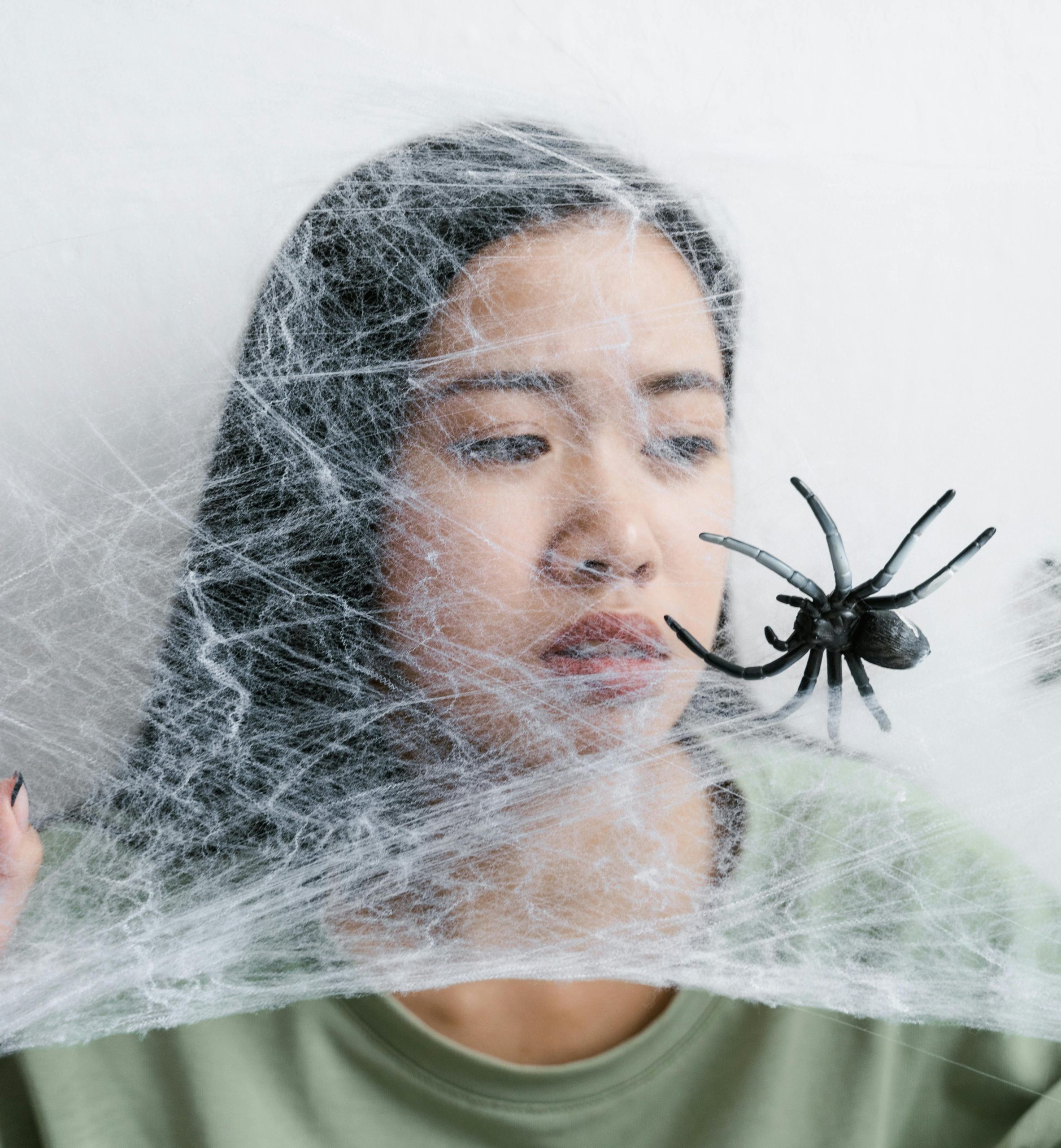 woman getting trapped in spider web because she doesn't know how to prevent scope creep