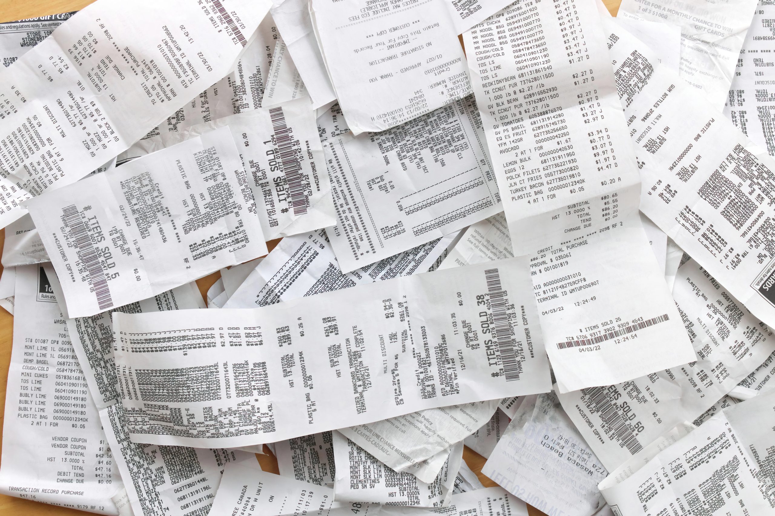 A pile of disorganized receipts