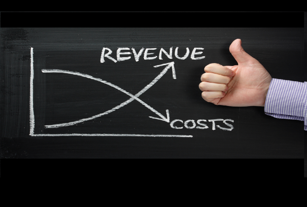 Chalkboard graph with revenue rising and costs falling and a thumbs-up—small business revenue vs profit.